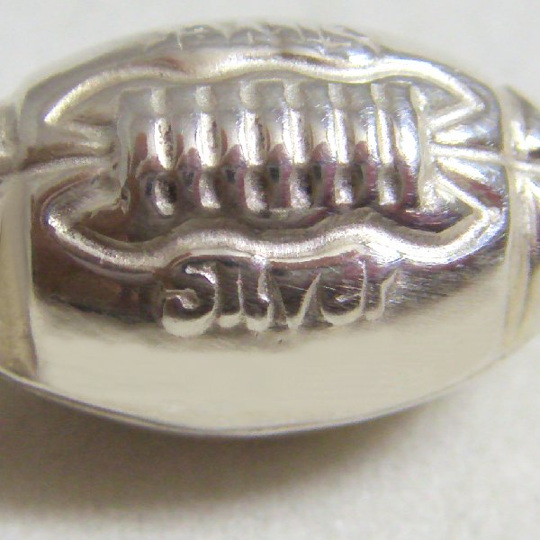 (p1299)Colgante de plata en motivo pelota de Rugby.